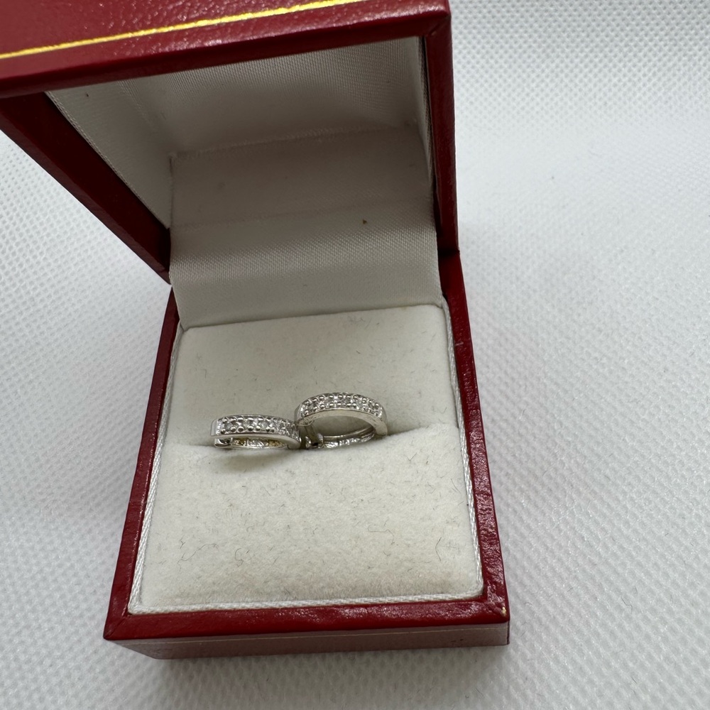 10 K genuine, diamond hoops